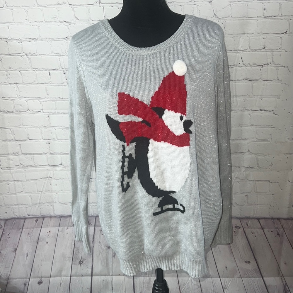 XXL winter sweater. Penguin skating. Wearing his Pom Pom hat. Shimmer